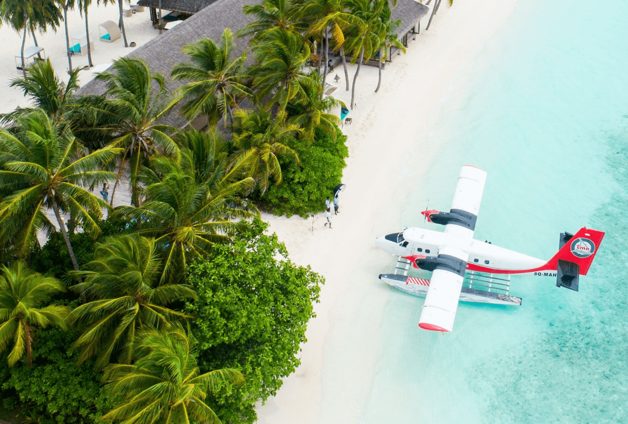 Tropical beach with seaplane